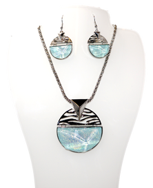 Beautiful Necklace & Earrings Round Sculpture Of Ocean Waves with a 18 inch chain and 2 inch extender It shimmering light blue resin resembling the beautiful waters of the Sea