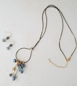 Necklace and Earring set Shades of blue and Gray Brown Chain with a little sparkle with CZ's with Gold tone accents   Necklace is nice long 30 inches with a 3 inch extender.  Gold tone shepherd hook 2 bead earrings.