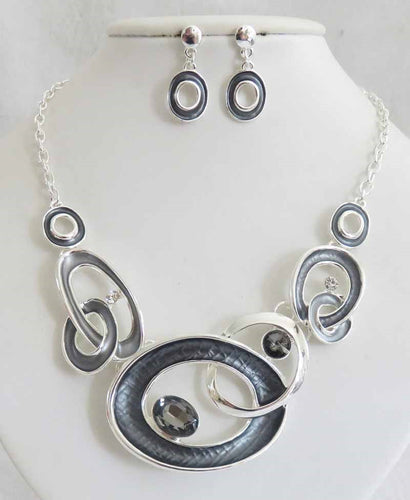 Necklace and Earring Set with Oval designs, Charcoal color inlay paint, with clear and charcoal CZ's. 16 inches. Earrings are post dangles.