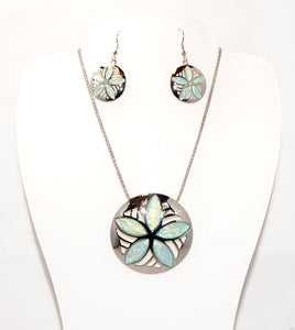 Beautiful Necklace & Earrings Palm Tree Ocean Waves Set with a 18 inch chain and 2 inch extender It shimmering light blue resin resembling the beautiful waters of the Sea.